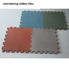 Interlocking rubber floor tiles